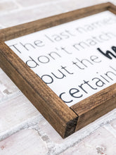 Load image into Gallery viewer, The Last Names Don’t Match But The Hearts Certainly Do Framed Sign - Gift