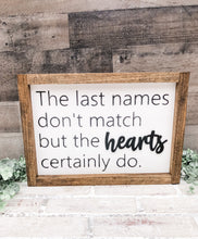 Load image into Gallery viewer, The Last Names Don’t Match But The Hearts Certainly Do Framed Sign - Gift