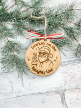 Load image into Gallery viewer, Six Seven Santa Ornaments
