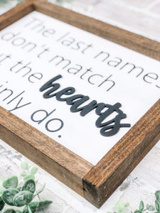 The  Last Names Don’t Match But The Hearts Certainly Do Framed Sign - Gift